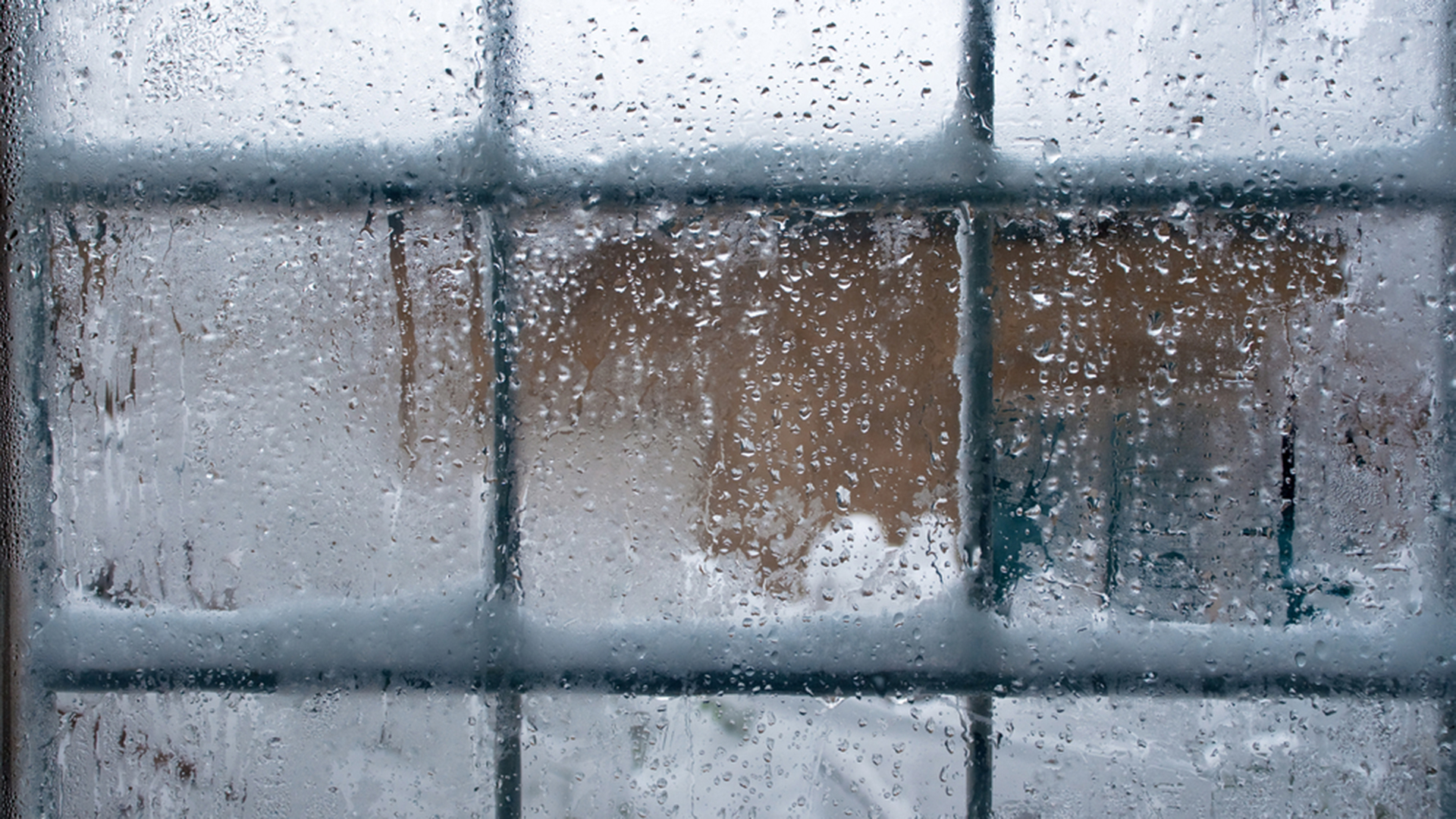 Winter window, drops of water and snowflakes on a window pane.; Shutterstock ID 122111422; PO: david-today